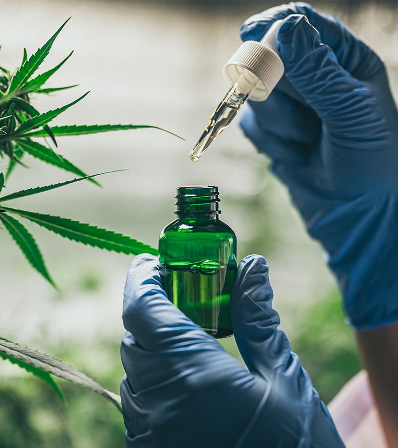 Dispensing oil from a pipette into a bottle
